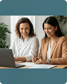 Smiling office team collaborating in a bright corporate environment.
