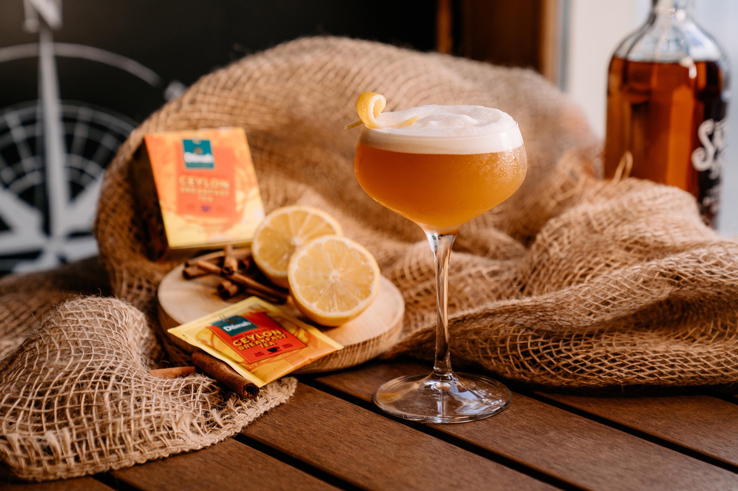 Tea Inspired Concepts. Cocktail with tea in a glass