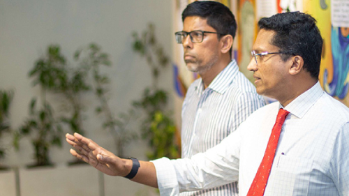 Malik and Dilhan in white shirts